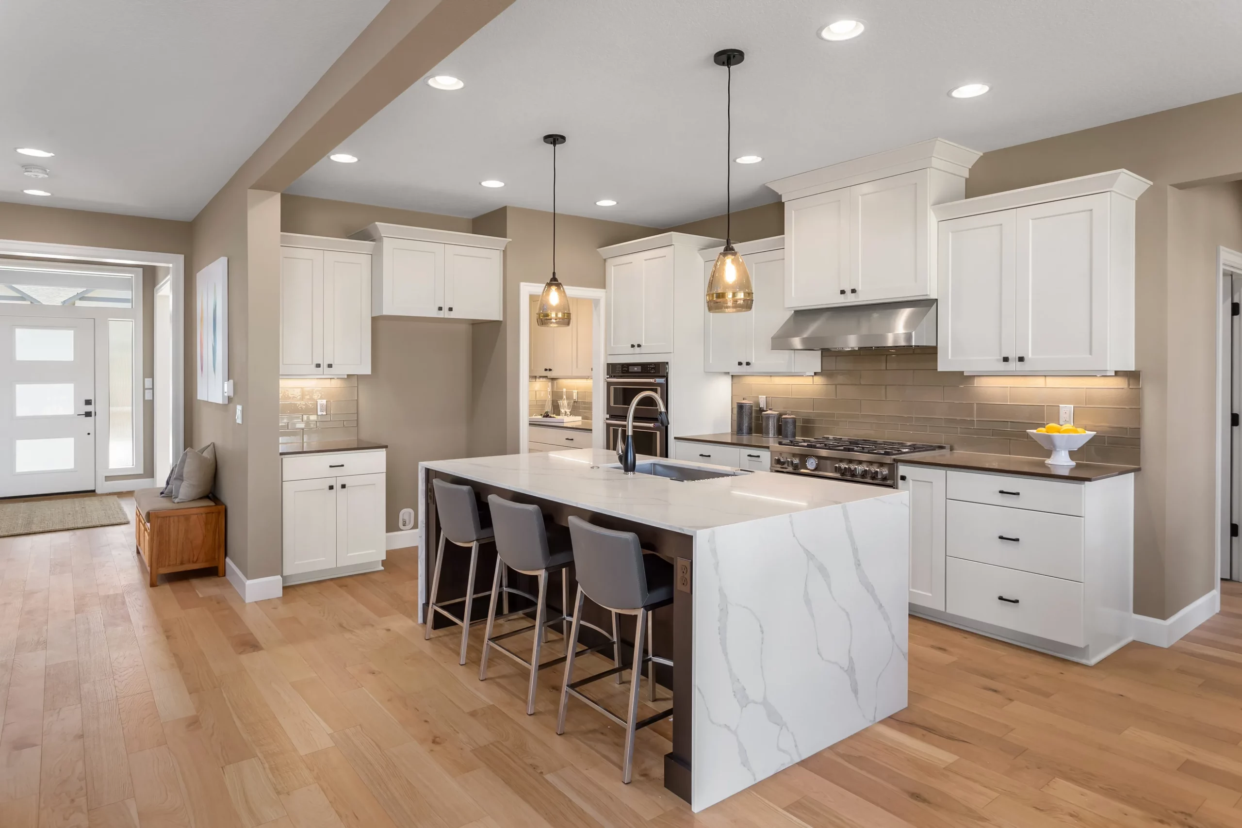 Newly Remodeled Kitchen with Quartz Countertops and White Cabinets